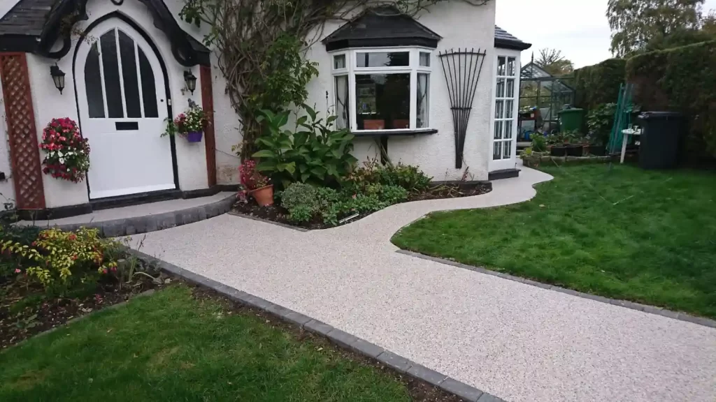 Wavy resin-bound path to front door and around the house